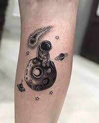 Astronaut Tattoo In Hand Astronaut Tattoo Tattoo Designs Men Tattoos