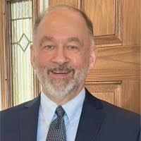 D. Lee England, MAI, J.D.