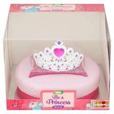 The cake itself is four layers of dense chocolate sponge, sandwiched with chocolate frosting and adorned with fluorescent swirls of orange and pink or yellow and green frosting. Asda Be A Princess Cake Princess Cake Online Food Shopping Delivery Groceries