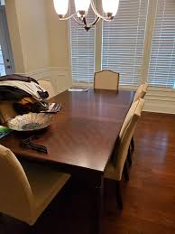 barely used dining room table with 6