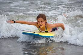 Image result for kids surfing on a boogie board