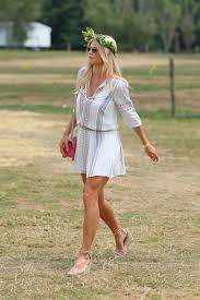 Elin nordegren places a hand on her baby bump as she watches her son play flag football in florida credit: Elin Nordegren S Feet Wikifeet