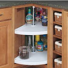 It's especially useful in deep storage areas like corner cabinet shelves. Rev A Shelf Traditional Door Mount Pie Cut 2 Shelf Polymer Lazy Susans For Kitchen Base Corner Cabinets Kitchensource Com