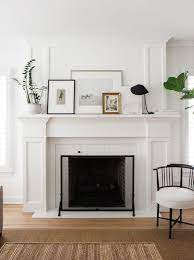 8 Ways To Style A Mantel With Art