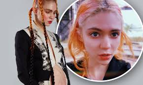 Elon Musk's girlfriend Grimes confirms pregnancy and is struggling ...