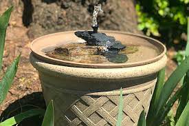 I made mine almost identical to hers except the top flat piece for the actual bath part. Diy Solar Bird Bath Fountain 6 Easy Steps Bird Feeder Hub