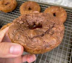 If you buy from a link, we may earn a commission. Chocolate Pumpkin Protein Donuts Cheat Day Design