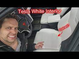 white seats in a 5 year old tesla