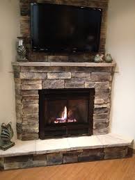 Corner Fireplace With Tv Mounted Above