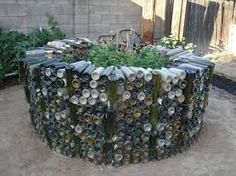 hot garden bed with recycled wine bottles