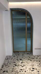 laminated fluted glass door with gold