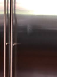fix scratch on stainless steel fridge