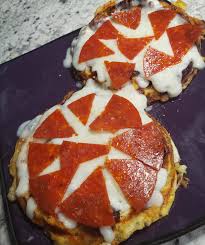I like to dip them in a little marinara sauce like some might dip a breadstick. Keto Chaffle Pizza Quirkshire