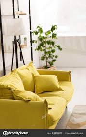 comfortable yellow sofa cushions living