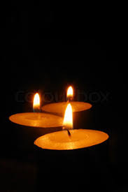 Image result for candle lighting a dark room
