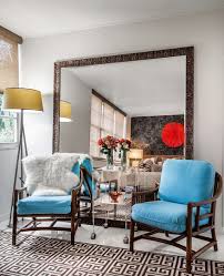 with mirrors in a small living room