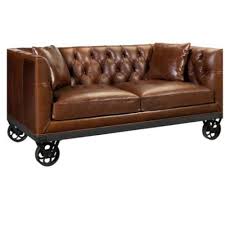 brown wooden chesterfield sofa with