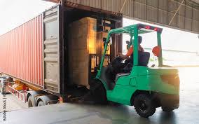 forklift tractor loading cargo pallet
