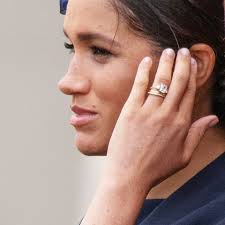 The ring is obviously yellow gold because that's markle's favorite and the main stone itself i sourced from botswana and the little diamonds either side are schwartz also resized and reset meghan's engagement ring. See Meghan Markle S Newly Redesigned Engagement Ring In Photos