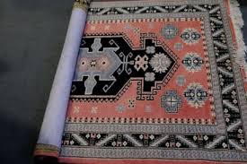 persian woollen pink ground rug with
