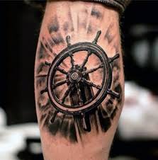 One modified version you can try is anchor and compass tattoo like this. 18 Incredible Ship Wheel Tattoo Ideas Styleoholic