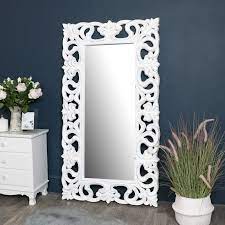 large ornate white wall floor mirror
