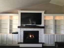 Fireplace Built With White Stone Veneer