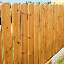 to stain a fence with a pump sprayer