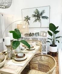 Its tropical decor will have you dreaming of palm trees and sandy beaches in no time! 28 Exellent Boho Home Decor Decortez Tropical Home Decor Tropical Dining Room Tropical Living Room