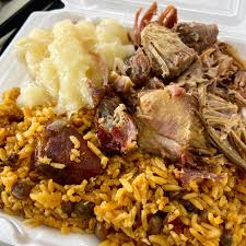 Once you see the beans boiling with the tomato sauce. I Ate Puerto Rican Rice And Beans Pernil De Cerdo And Stewed Yuca Food