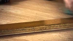 remove old floor wax from wood floors