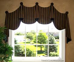 A curved top window in a wall or an eyebrow dormer; Eyebrow Window Treatments Newton Custom Interiors