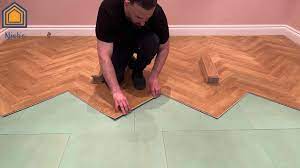 laying herringbone laminate flooring