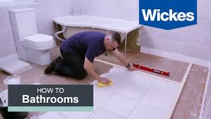 To create the windmill pattern, four rectangular tiles are arranged around a square tile in the centre. How To Tile A Bathroom Wall With Wickes Youtube