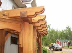 Freestanding in a garden, gracing a patio or surrounding a hot tub, a pergola creates a dramatic architectural statement. Pergola Rafter Tail Designs Google Search Pergolas Rafter Pergola Pergola Rafter Tails Design Pergola Rafter Tails