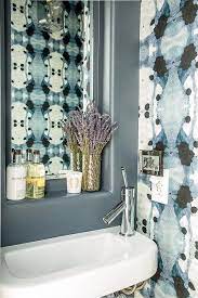 blue bathroom with eskayel wallpaper