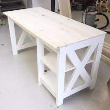 It is a farmhouse table in the sense that it is plain, strong, and can seat many people. Farmhouse Desk Plans Handmade Haven