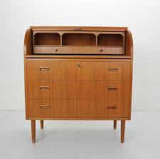 The design is wonderful and the door lifts down to use as a work surface and also slides under the top. Mid Century Modern Rolltop Secretary Desk By Egon Ostergaard 1970s 115808