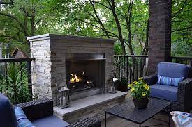 75 Backyard Deck With A Fireplace Ideas