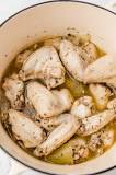 Should I boil chicken wings before frying?