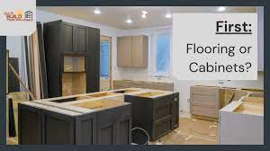 what comes first flooring or cabinets