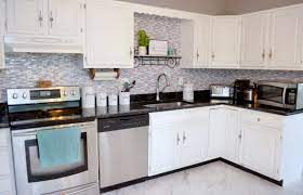 Not with peel and stick backsplashes that imitate tilework at a fraction of the cost. Diy Peel Stick Kitchen Backsplash Amy Latta Creations