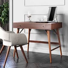 Doing so opened up square footage in the center of the space making the room feel open and airy instead. 27 Best Desks For Small Living Spaces Homes 2021
