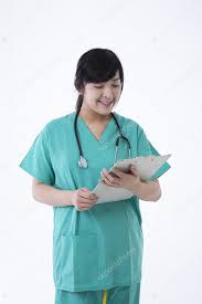 Asian Doctor Reading A Chart Stock Photo Sjenner13