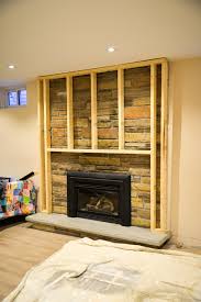 How to paint a stone fireplace. How To Update A Stone Fireplace Rambling Renovators