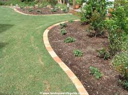 Brick and concrete lawn edging look more formal and sophisticated. Brick Garden Edge Brick Garden Brick Garden Edging Garden Edging