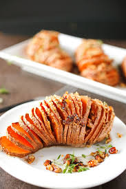 Hasselback Sweet Potatoes With Thyme Pecans And Parmesan