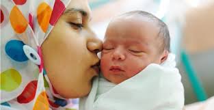 Image result for two muslim ladies breastfeeding a baby