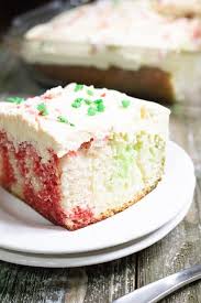 Carefully pour red gelatin over 1 cake layer and green gelatin over the second cake layer. Christmas Poke Cake Moore Or Less Cooking