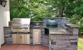Custom outdoor kitchens create the perfect destination for relaxation, dining and entertaining in your own back yard! Outdoor Kitchen Photos Custom Kitchens Big Green Egg Outdoor Grills Big Green Egg Outdoor Kitchen Outdoor Kitchen Outdoor Kitchen Design